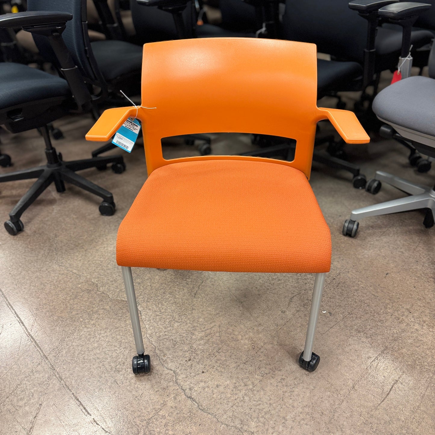 Steelcase Move Stackable Side Chair/Office Chair on Wheels (Orange/Silver Frame) - Best Deal Office Las_Vegas