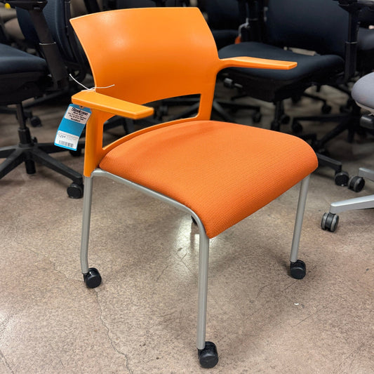 Steelcase Move Stackable Side Chair/Office Chair on Wheels (Orange/Silver Frame) - Best Deal Office Las_Vegas